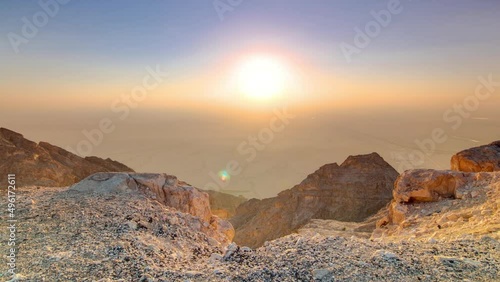 Sunset with rocks timelapse. Jebel Hafeet is a mountain located primarily in the environs of Al Ain photo