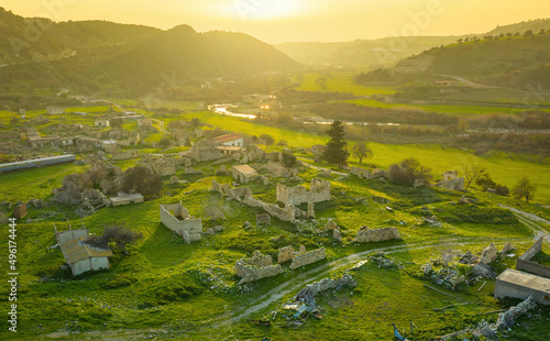 Abandoned village Souskiou in Paphos district, Cyprus. Aerial landscape at sunset