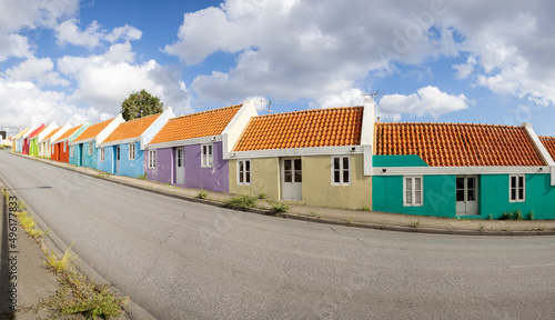 Small colorful houses along the road somewhere in Willemstad, Curacao photo