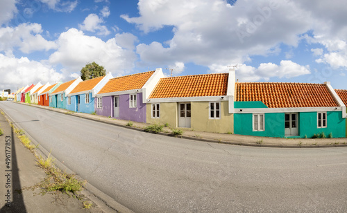 Small colorful houses along the road somewhere in Willemstad, Curacao © freedom_wanted