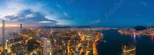 Photography Aerial view of the Victoria Harbour, Hong Kong, at Twilight time