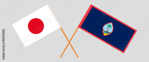 Crossed flags of Japan and Guam. Official colors. Correct proportion