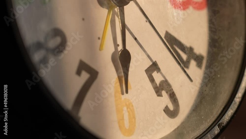 Macro close up shot of clock, watch. Time concept with macro camera. Timepiece, alarm clock classic analog timer