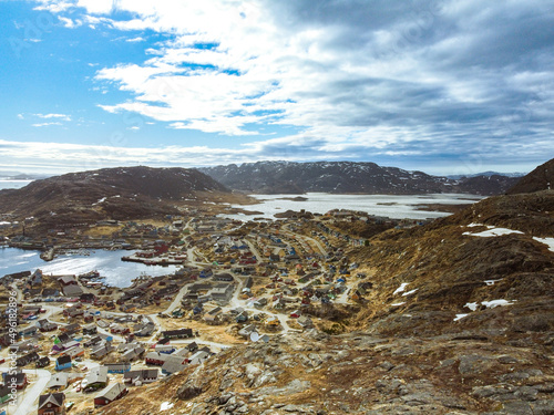 Aerial view small beautiful village over snow in Qaqortoq Greenland Europe photo