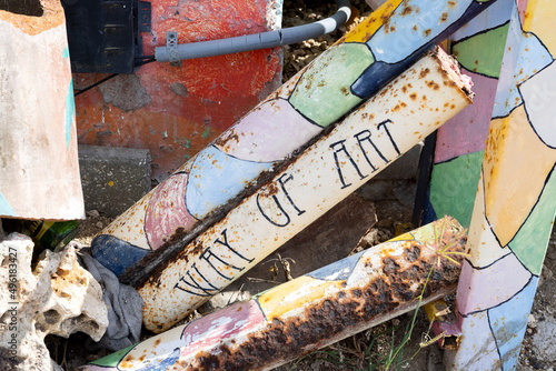 Rusty pipes with the text "WAY OF ART" in Willemstad, Curacao