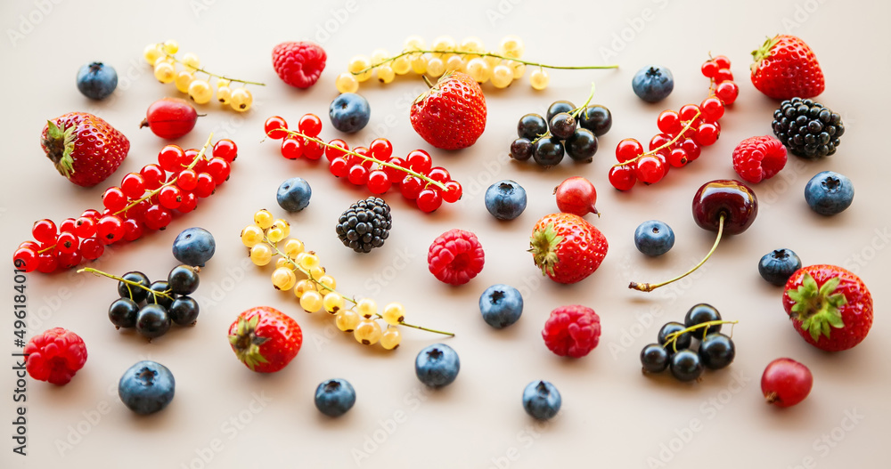 Fresh summer berries on a neutral background Fresh summer berries on a neutral background