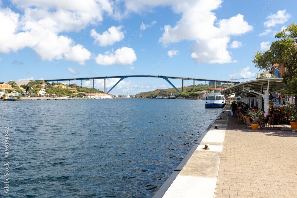 Queen-Juliana-Bridge viewed from the famous Queen-Emma-Bridge in the city center of Willemstad, Curacao