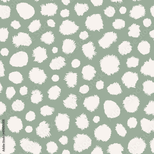 Abstract, distracted polka dot seamless repeat pattern on sage green background. Random placed, irregular vector grunge stains minimal all over print.