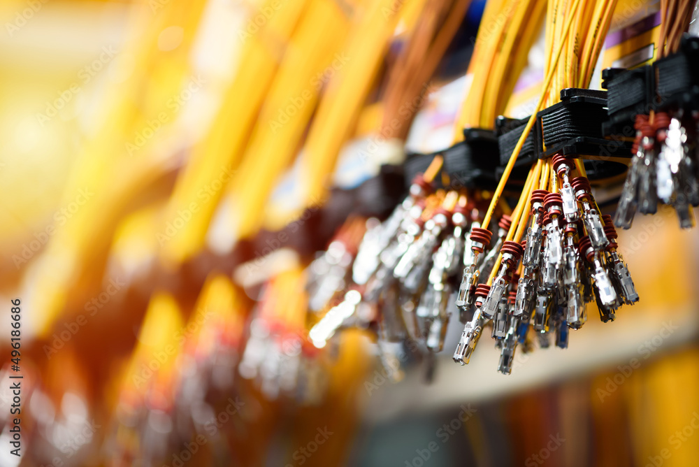 © dero2084 - Bundle of crimped cables with electrical connectors. Terminated wire ready for connection. Industrial theme © dero2084 - Bundle of crimped cables with electrical connectors. Terminated wire ready for connection. Industrial theme