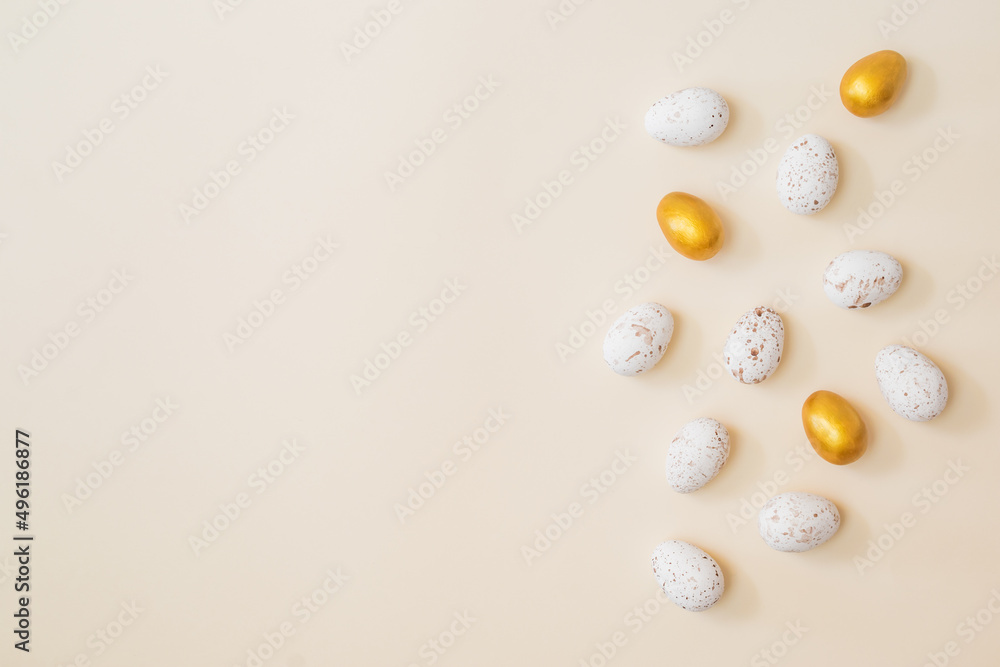 Flat lay easter composition with easter eggs on a beige background Flat lay easter composition with easter eggs on a beige background