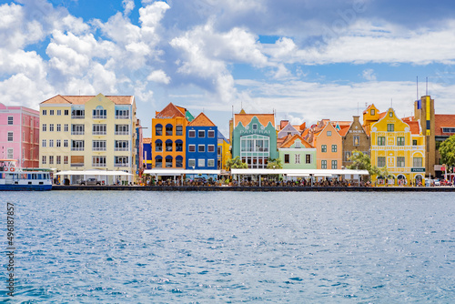 Famous colorful waterfront buildings in dutch-caribbean, colonial style viewed from the district Otrobanda in Willemstad, Curacao
