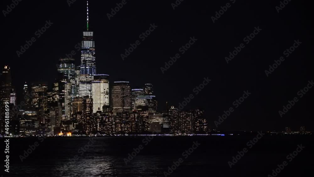 Downtown Manhattan at Night. Illuminated Skyscraper in New York City Downtown Manhattan at Night. Illuminated Skyscraper in New York City