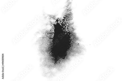 Black ink powder isolated on the white background.