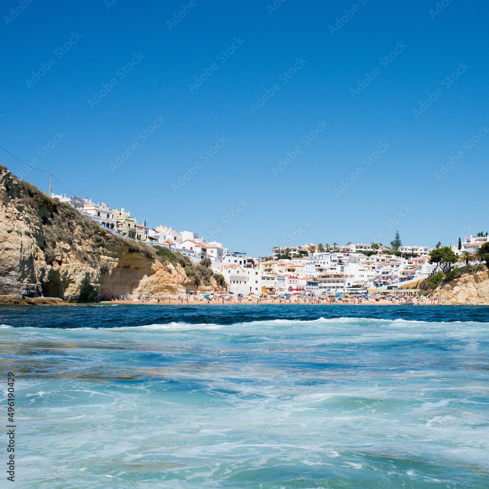 Carvoeiro seen from the ocean. Carvoeiro is a beautiful village on the coast of Algarve, Portugal. Europe