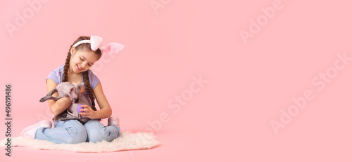 Little girl with bunny ears...