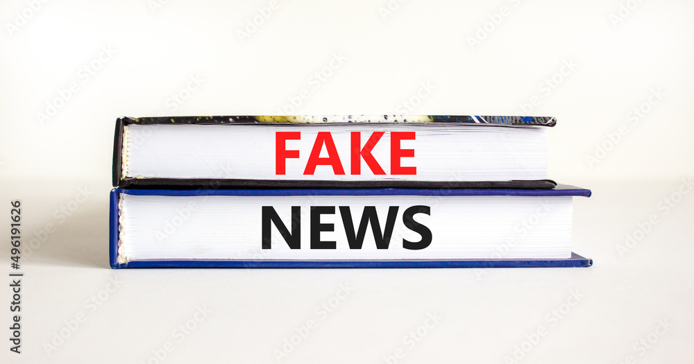Fake news symbol. Books with concept words Fake news on beautiful white background. Business media and fake news concept. Copy space.