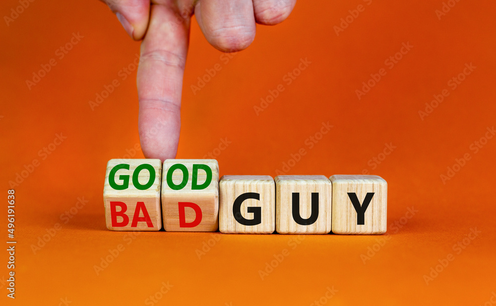 Good or bad guy symbol. Businessman turns cubes and changes concept