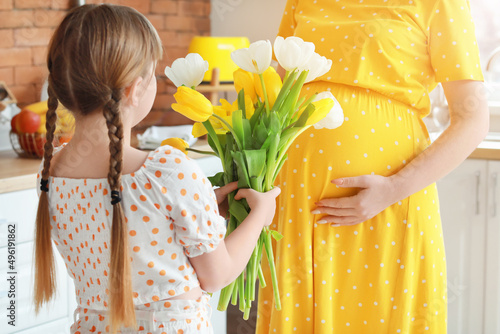Little daughter greeting he...