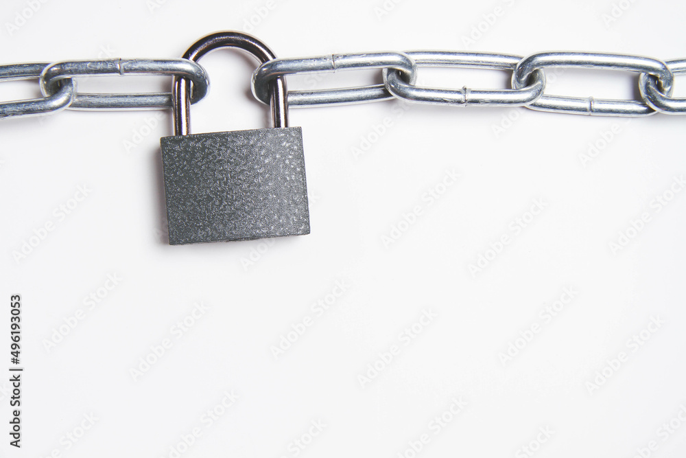 Chain and padlock on an isolated background. closed door. Metal chain.