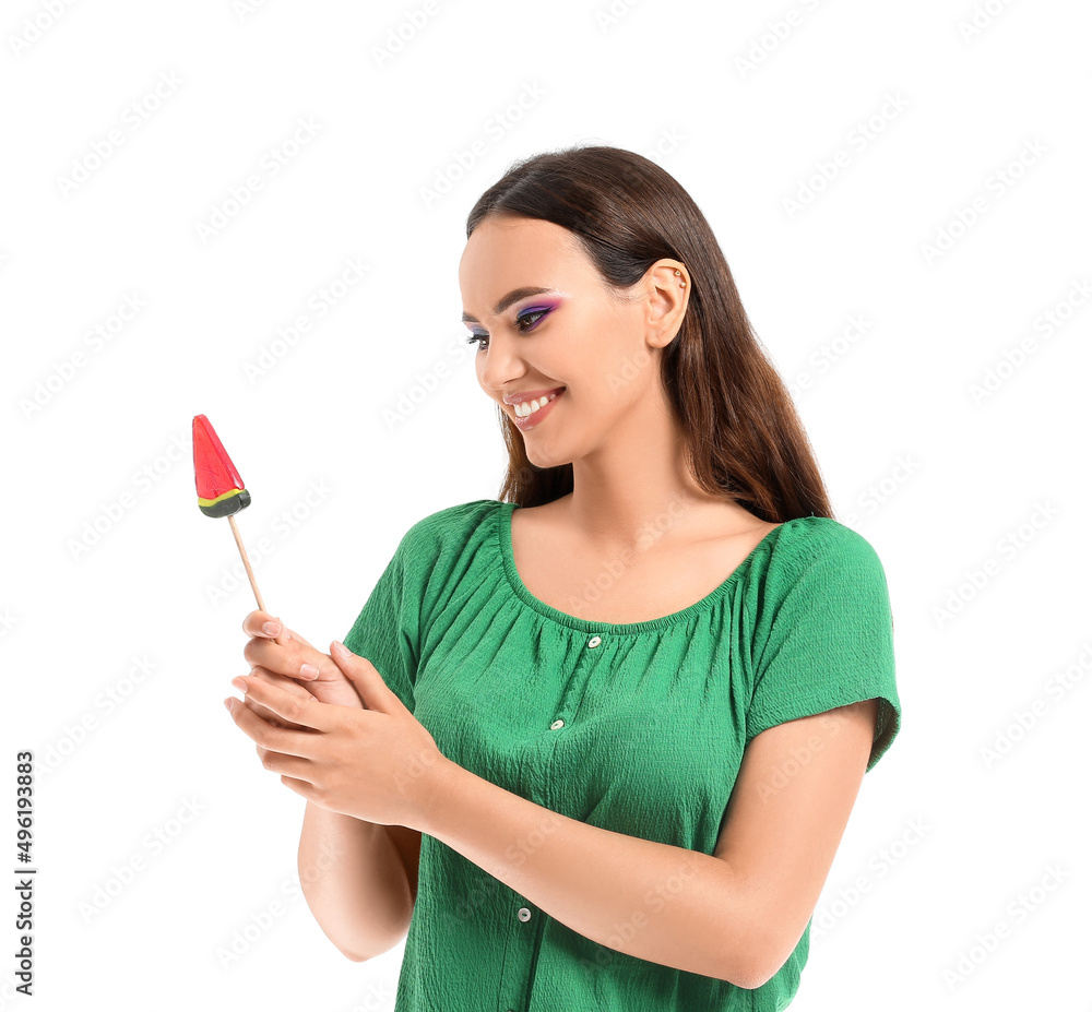 Young woman with lollipop in shape of watermelon on white background Young woman with lollipop in shape of watermelon on white background