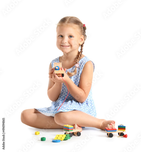 Cute little girl playing wi...