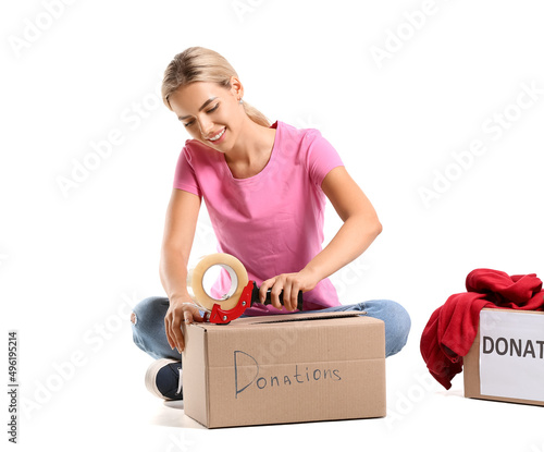 Beautiful woman packing box...