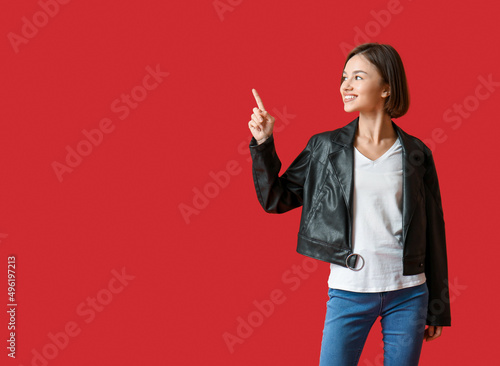 Beautiful young woman in st...