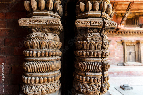 Carved wooden pillar inside of the royal palace in Patan, Lalitpur in Nepal, Asia photo