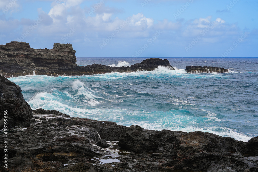 Waves crashing near the Olivine tide pools in the Pacific Ocean along the Kahekili Highway in West Maui, Hawaii, United States