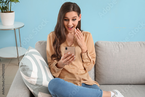 Beautiful surprised young w...