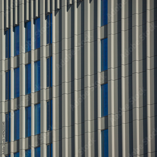 Wallpaper Mural Modern building facade. 
vertical lines abstract facade in modern office building Torontodigital.ca