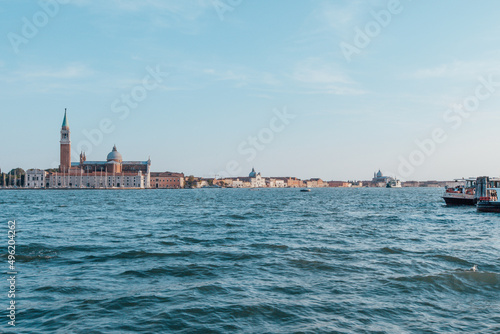 Venice lagoon on sunny day, Italy. Old italian architecture. Travel Background for a poster, calendar, poster, screensaver, wallpaper, card, banner, cover, a place to copy your design or text