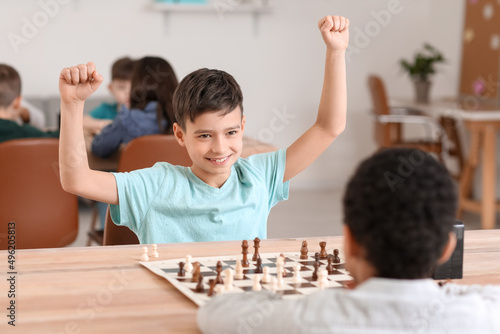 Little children playing che...