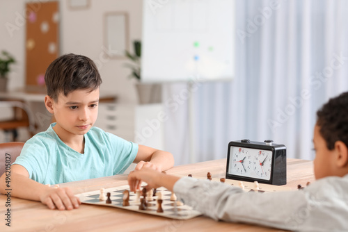 Little children playing che...