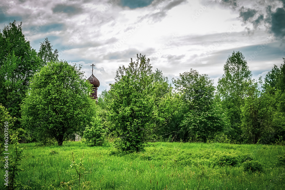 landscape orthodox church in the forest