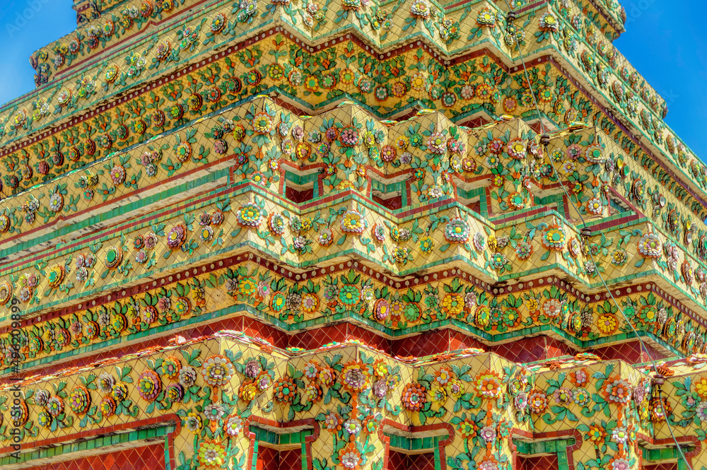Colourful traditional decorations at Buddhist temple structures in Thailand. Colourful traditional decorations at Buddhist temple structures in Thailand.