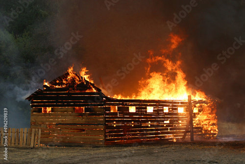 burning wooden building