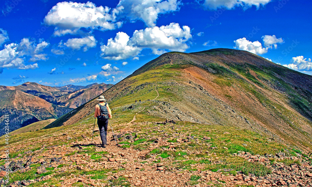 Hiker ascends Colorado's 13,000-foot Mount Sniktau near Loveland Pass
