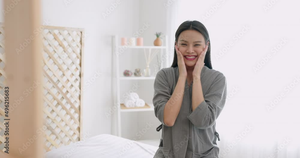 Asian beauty skincare woman touching skin on face after beauty and spa treatment. Asian beauty skincare woman touching skin on face after beauty and spa treatment.