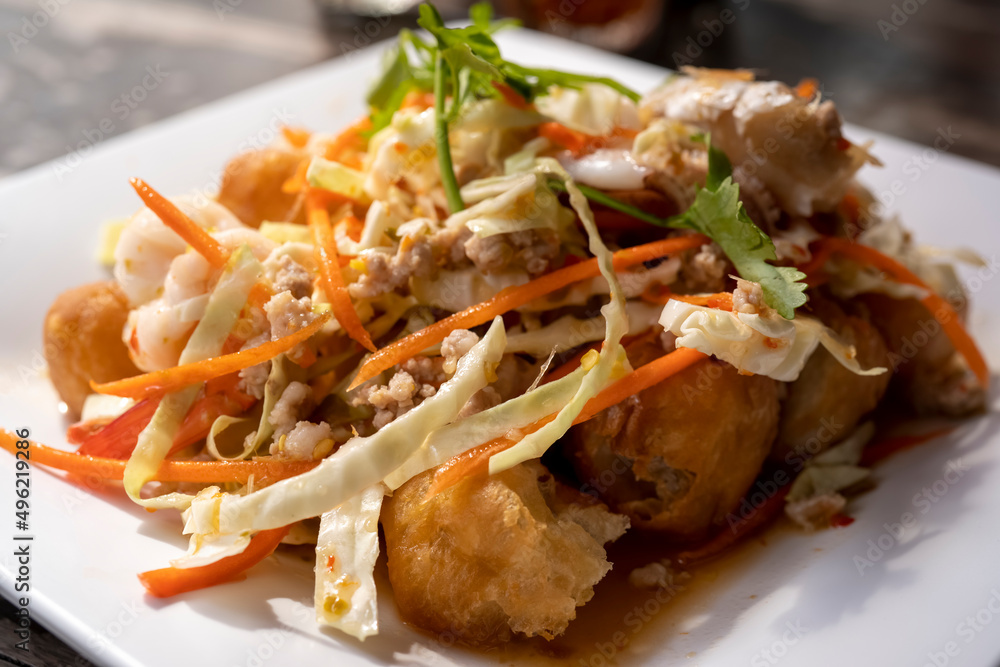 Spicy salad of deep-fried dough, Thai style food Spicy salad of deep-fried dough, Thai style food