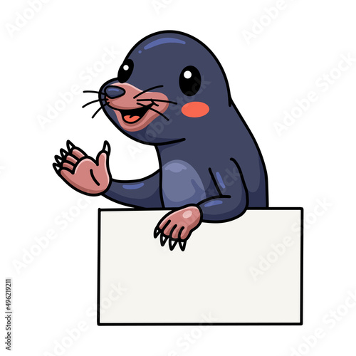 Cute little mole cartoon with blank sign