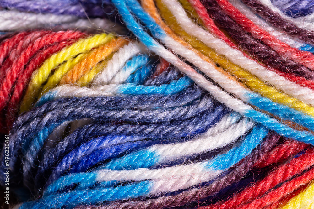 Multicolored threads yarn skein. Melange threads for knitting hobby. Macro, close-up, full frame texture