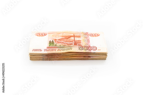 Banknotes of Russian rubles of various denominations on a white background. five thousand rubles