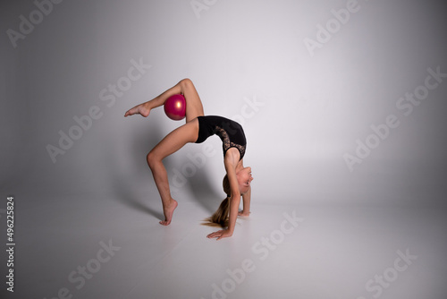 rhythmic gymnastics, girl gymnast and ball