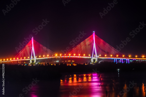 Shimmering night lights by Can Tho bridge, Vietnam