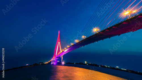Shimmering night lights by Can Tho bridge, Vietnam © lochuynh