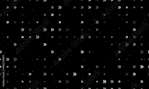 Seamless background pattern of evenly spaced white double arrow symbols of different sizes and opacity. Vector illustration on black background with stars