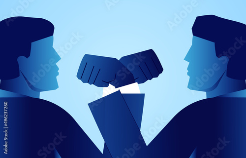 Two businessmen entwining arms and fists, partners fighting together or competitors fighting each other.