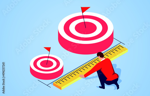 Businessman holding a ruler to measure the distance from a small target to a big target, predicting and planning new goals in advance