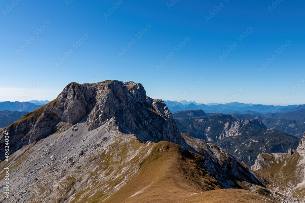 Panoramic view on the mountain peaks of the Hochschwab Region in Upper Styria, Austria. Sharp summit of Ebenstein in the beautiful Alps in Europe. Climbing tourism, wilderness. Concept freedom